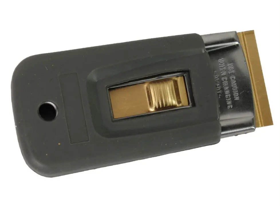 Deluxe Push Button Blade Holder 1